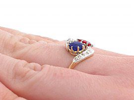 antique spinel and sapphire ring on finger