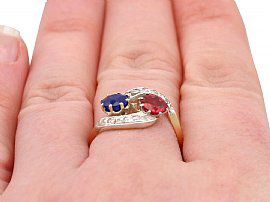 wearing a spinel and sapphire ring