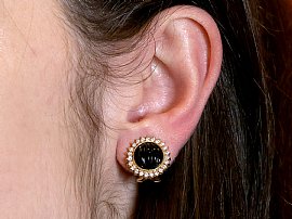 Diamond & Onyx Earrings Being Worn