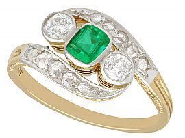 antique emerald and diamond twist ring in gold