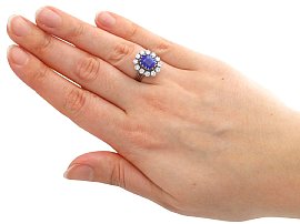 wearing Blue Sapphire and Diamond Cluster Ring for Sale