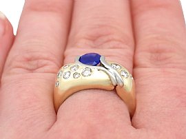 gold sapphire diamond ring wearing