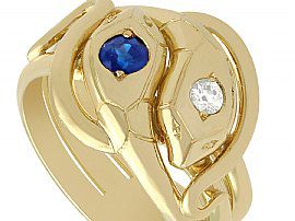 gold snake ring with sapphire and diamond