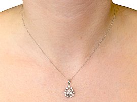 diamond cluster pendant white gold wearing