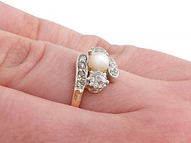 Rose Gold Pearl and Diamond Ring being worn