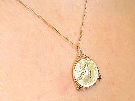 antique gold coin pendant wearing