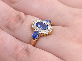 Sapphire and Diamond Ring Being Worn