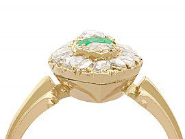 marquise shaped gold and emerald ring