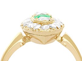 marquise shaped gold and emerald ring