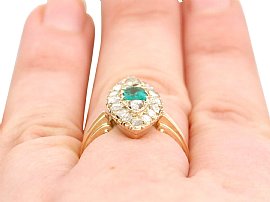 Wearing Emerald and Diamond Ring