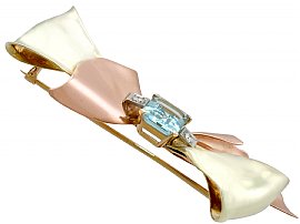 aquamarine bow brooch in gold