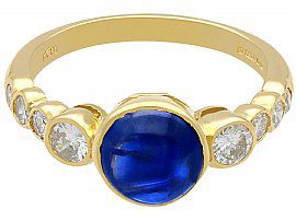sapphire cabochon ring with diamonds