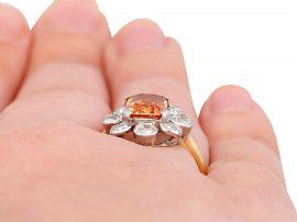 topaz diamond ring on finger