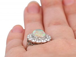 Wearing Opal and Diamond Cluster Ring 