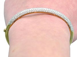 wearing gold diamond bracelet