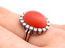 Red Coral and Diamond Ring on hand