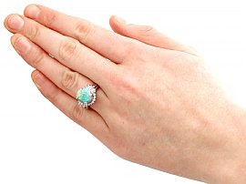 Wearing Opal and Diamond Cluster Ring in Platinum