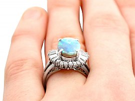 Opal and Diamond Cluster Ring in Platinum on the Finger