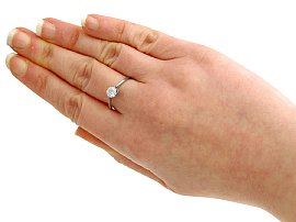 Antique Platinum Diamond Solitaire Ring on the hand