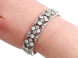 Antique French 1920's diamond and platinum bracelet wearing 