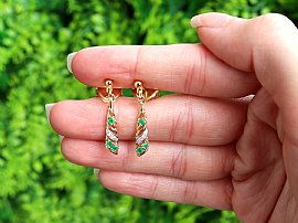 Emerald and Gold earrings outside 