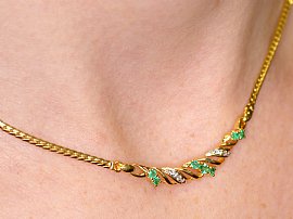 Emerald and Gold Jewellery Set wearing
