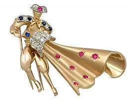 diamond and gemstone matador brooch