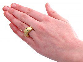 Chunky Gold Ring with Gemstones on hand