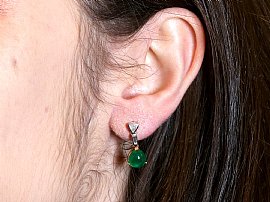 vintage emerald and diamond earrings wearing 