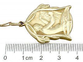 Gold Pendant with Ruler