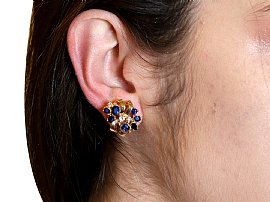 gold sapphire diamond earrings wearing
