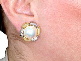 Wearing Mabe Pearl Earrings 