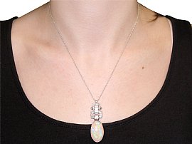 wearing Art Deco Opal and Diamond Pendant