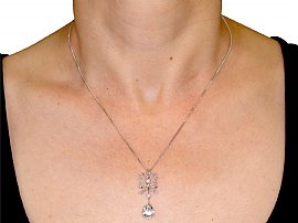 wearing platinum pear cut diamond pendant 