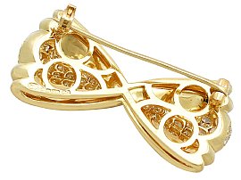 vintage yellow gold bow brooch with diamonds