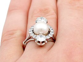 wearing pearl and diamond ring