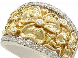 gold floral ring with diamonds