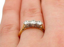 3 stone diamond anniversary ring yellow gold