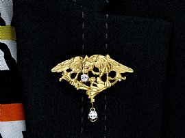 antique diamond griffin brooch wearing