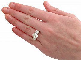 wearing a Three Stone Diamond Ring in White Gold 