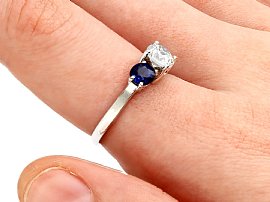 Sapphire and Diamond Trilogy Ring on finger