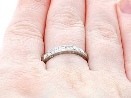Princess and Baguette Cut Eternity Ring Wearing Finger