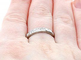 Princess and Baguette Cut Eternity Ring Wearing Finger