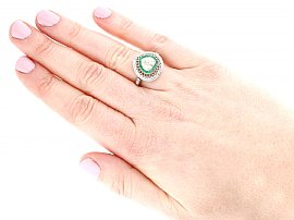 Heart Shaped Emerald and Diamond Ring Wearing 