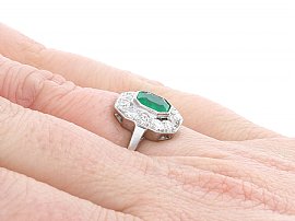 White Gold Emerald and Diamond Ring Wearing Hand