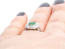 White Gold Emerald and Diamond Ring Wearing Finger