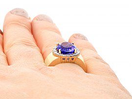 Vintage Tanzanite Ring with Diamonds Wearing Finger
