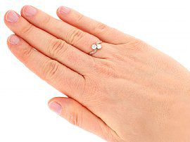 Two Diamond Twist Engagement Ring on the hand