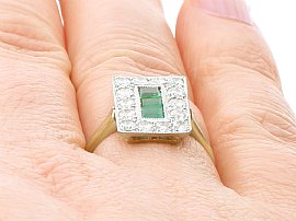 Rectangular Emerald and Diamond Ring Wearing Finger