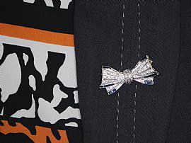 Diamond and Sapphire Bow Brooch Wearing